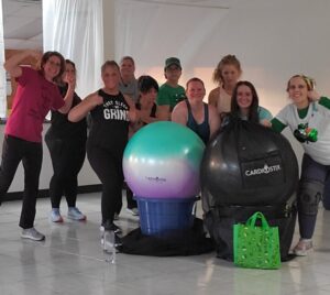 Group exercise class with fitness balls